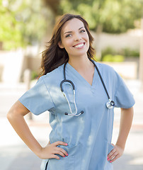 Image showing Proud Young Adult Woman Doctor or Nurse Portrait Outside