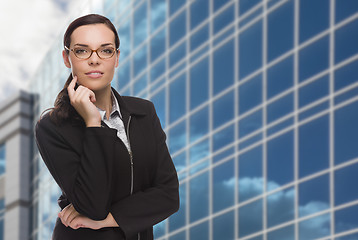 Image showing Confident Attractive Mixed Race Woman in Front of Corporate Buil