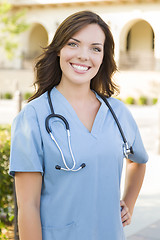 Image showing Proud Young Adult Woman Doctor or Nurse Portrait Outside