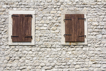 Image showing Windows in the old stone wall