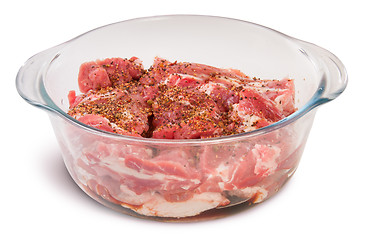 Image showing Raw Pork With Spices In A Glass Bowl