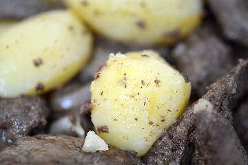 Image showing Mixed grill on a plate, meat and potatoes