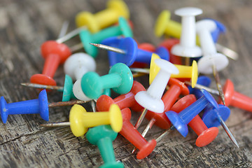 Image showing Set of old pins on wood background