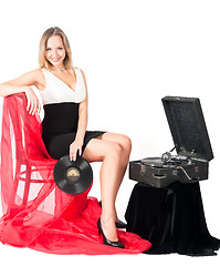 Image showing Pretty blonde woman with gramophone