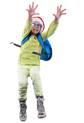 Image showing happy Christmas schoolgirl or traveler exercising, running and jumping