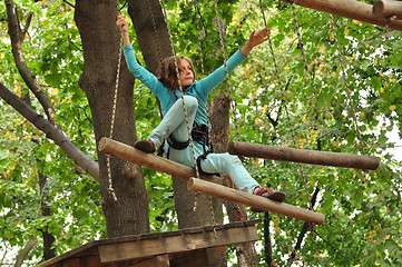 Image showing girl  in a climbing adventure activity park