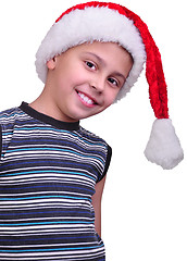 Image showing child with Santa Claus red hat