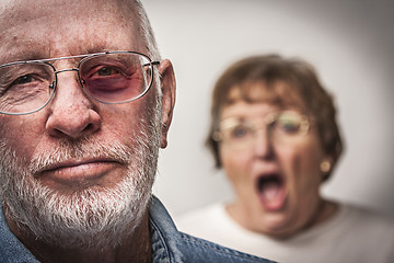 Image showing Battered and Scared Man with Screaming Woman Behind