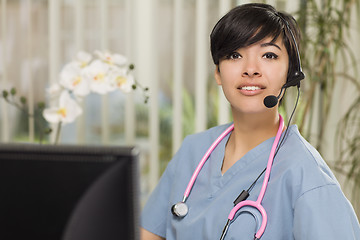 Image showing Mixed Race Female Nurse Practitioner or Doctor at Computer
