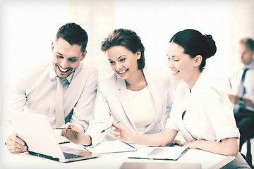 Image showing business team having discussion in office