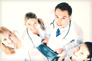 Image showing young group of doctors looking at x-ray