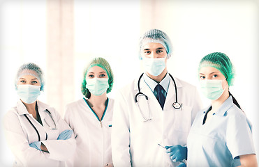 Image showing group of doctors in operating room