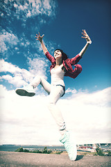 Image showing beautiful dancing girl jumping