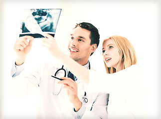 Image showing two doctors looking at x-ray