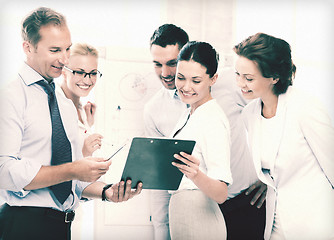 Image showing business team discussing something in office