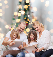 Image showing happy family with tablet pc computers