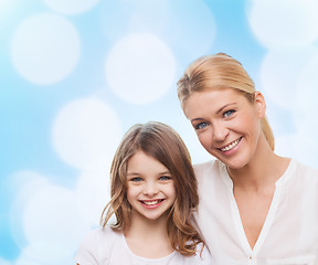 Image showing smiling mother and little girl