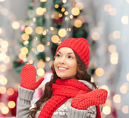 Image showing smiling young woman in winter clothes