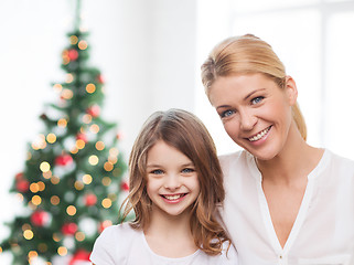 Image showing smiling mother and little girl