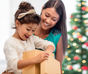 Image showing happy mother and child girl with gift box