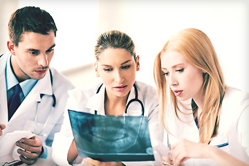 Image showing young group of doctors looking at x-ray