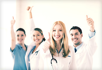 Image showing group of doctors showing thumbs up