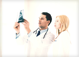 Image showing two doctors looking at x-ray