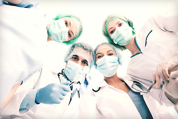 Image showing group of doctors in operating room