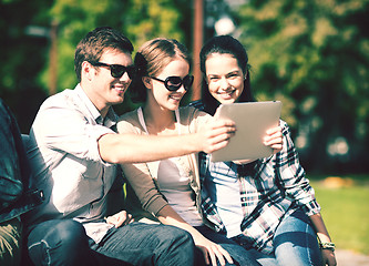 Image showing teenagers taking photo outside