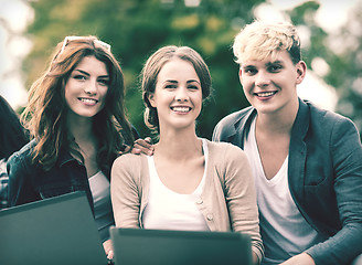 Image showing students or teenagers with laptop computers