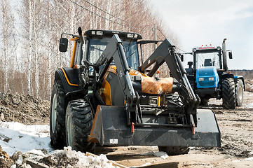 Image showing Plow tractors on agricultural machinery exhibition