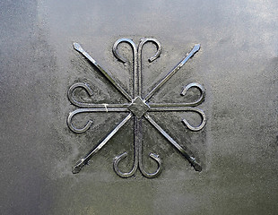 Image showing Forged pattern on a black metal gate as a backdrop