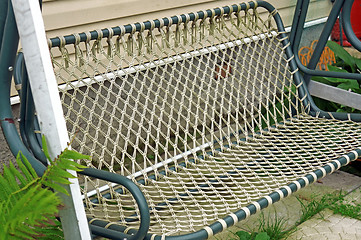 Image showing Garden wicker swings closeup