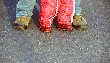 Image showing man and baby girl legs 