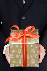 Image showing Businessman with gift