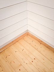 Image showing Empty room corner with wooden floor