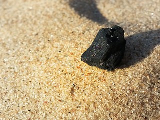 Image showing Burned Log on Sand Beach