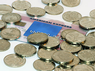 Image showing Bunch of coins with credit card