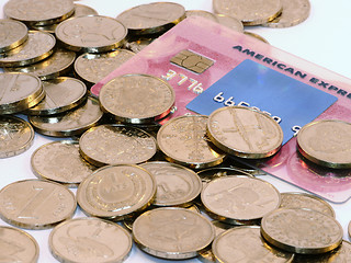 Image showing Bunch of coins with credit card