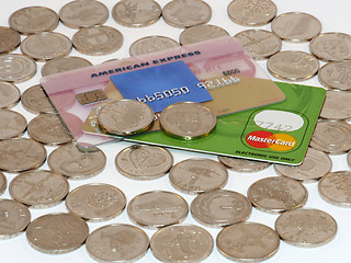 Image showing Bunch of coins with credit card