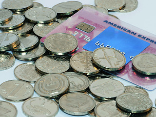 Image showing Bunch of coins with credit card