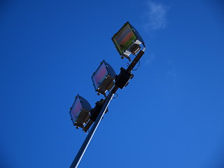 Image showing Stadium light against blue sky