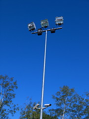 Image showing Stadium light against blue sky