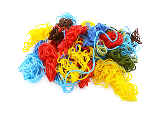 Image showing Multi-coloured embroidery threads in a tangled heap