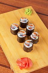 Image showing sushi rolls with tobico and pancake