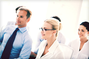 Image showing businessmen and businesswomen on conference