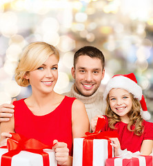 Image showing happy family with gift boxes
