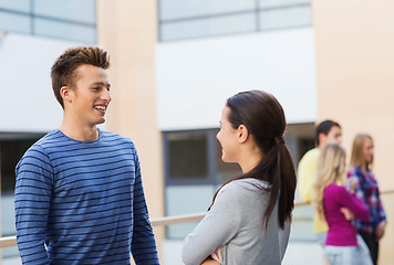 Image showing group of smiling students outdoors