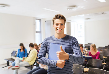 Image showing group of smiling students in lecture hall