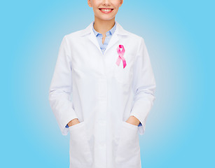 Image showing close up of doctor with cancer awareness ribbon